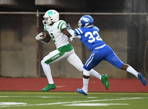 A.J. Johnson caught two touchdown passes in his debut for Newman.