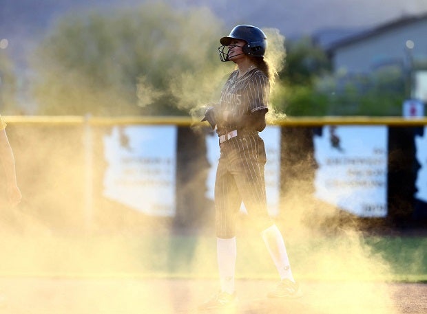 Shadow Ridge's J'kai'a Graves creates a cloud of dust after her double and slide into second.(Photo: Kevin French)