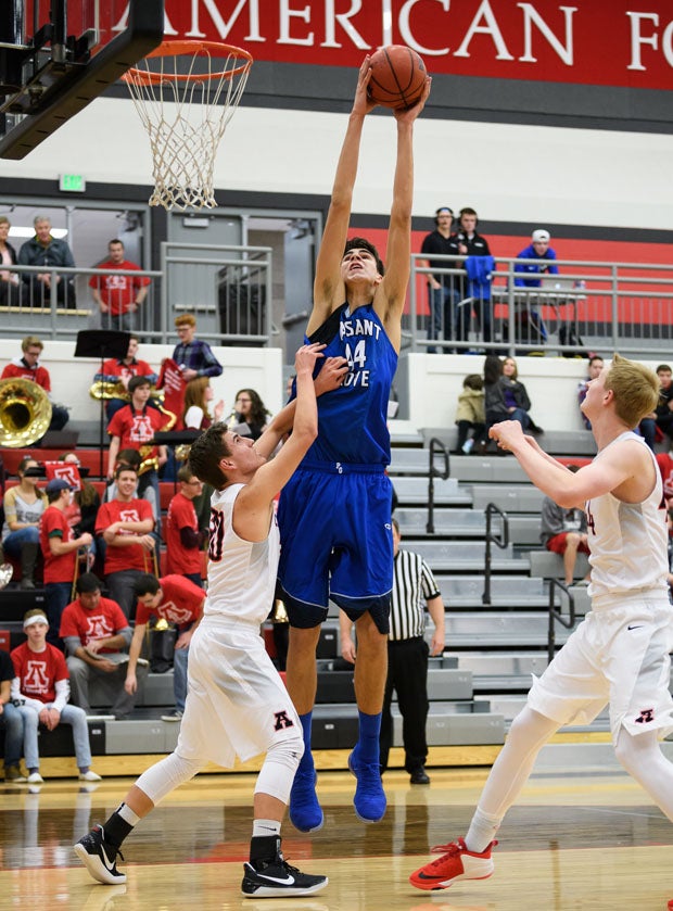 The long reach of 7-3 junior Matt Van Komen, Pleasant Grove (Utah).