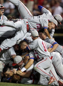 Tomball celebrates its first state
title in style with an awesome
dog pile. 
