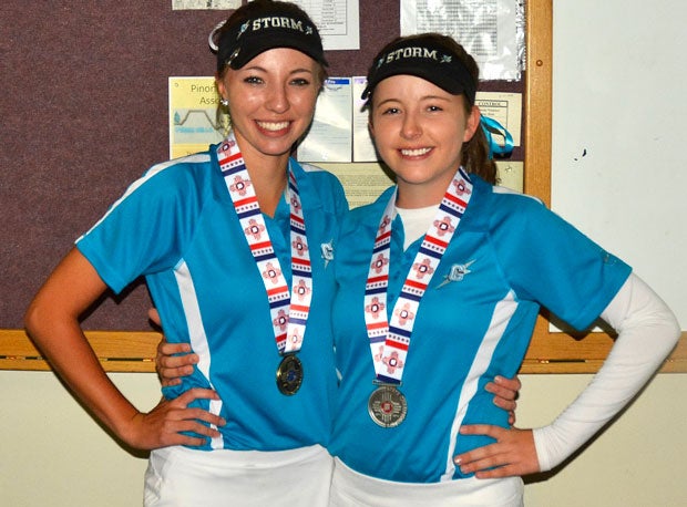 Dominique Galloway, left, and sister Jacque Galloway show off their medals.