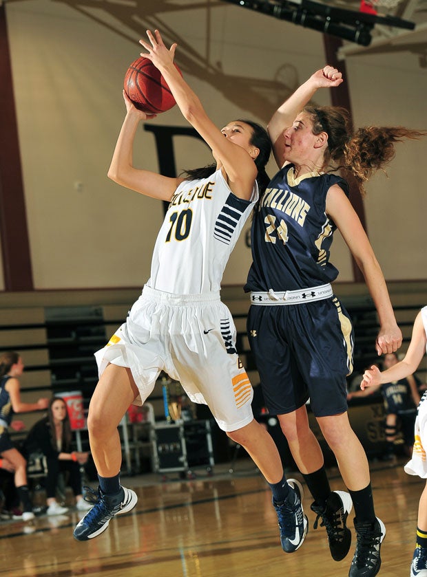 Bellevue's Elisa Park goes up under heavy duress from Evelyn Fox. 