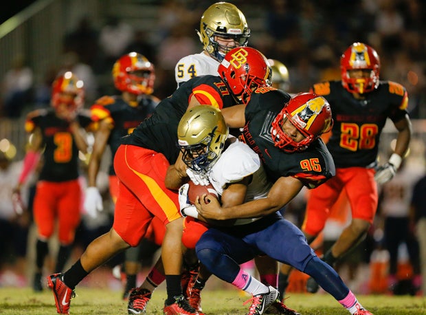 Deerfield Beach gutted out an upset win Friday over No. 4 St. Thomas Aquinas on a rainy night.