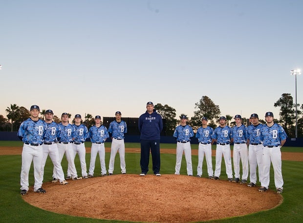 Barbe coach Glenn Cecchini with the 2014 team, the first of three straight state championship teams.