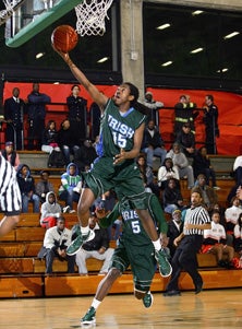 Sacred Heart Cathedral's Herman
Pratt is a lightning bolt to the rim.