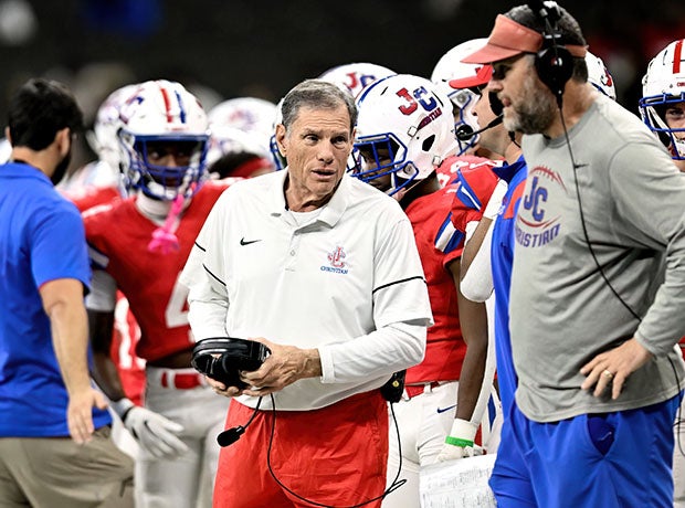 J.T. Curtis consults with an assistant coach during last season's Division I Select championship game in Louisiana, a 23-0 victory for his program and the 615th of his career. (Photo: Kenneth P. Steib)