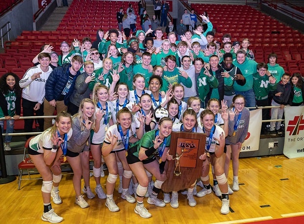New Castle poses with its fans after winning the Indiana 4A state title.