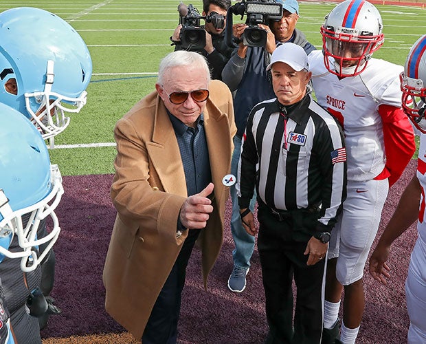 Dallas Cowboys owner Jerry Jones performs the coin toss before the Spruce (Texas) at Jefferson game.