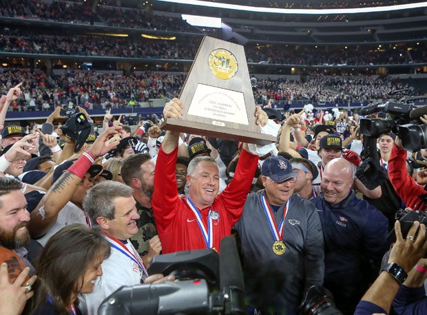 Allen coach Terry Gambill celebrates his team's UIL Texas 6A-1 championship on Saturday.