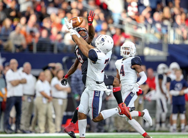 Allen's CJ Johnson (7) goes up over Garrett Wilson (5).