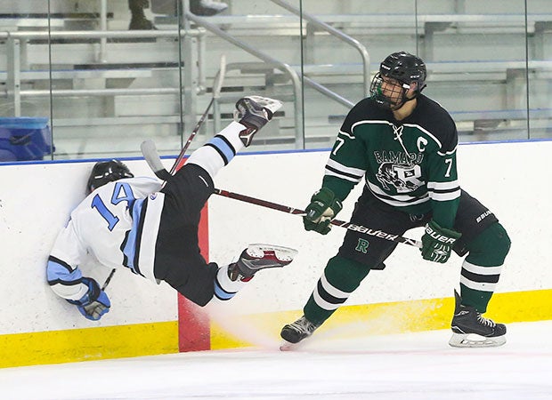 Dante Puleo of Ramapo (N.J.) lays a hit on Mahwah's Nikolas Uva in the first round of the Bergen County Tournament.