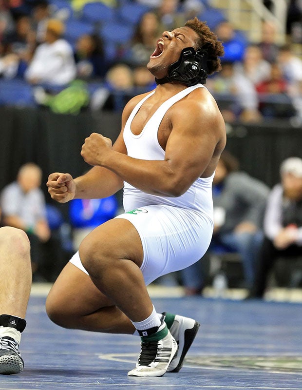 A North Carolina wrestler reacts after winning his match in the finals of the NCHSAA 3A Wrestling Championships.