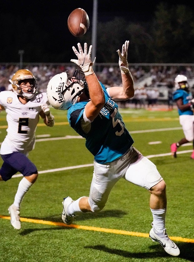 Sheldon's Scott Nixon eyes in an over-the-shoulder touchdown grab against Sheldon. Nixon had 18 catches for 205 yards and four TDs on the night. (Photo: Ray Iaea)