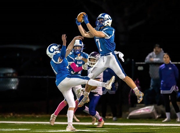 Kennebunk senior Jack Cataldi makes a leaping interception on senior night in a 44-14 victory over Marshwood.(Photo: Dave Arnold)