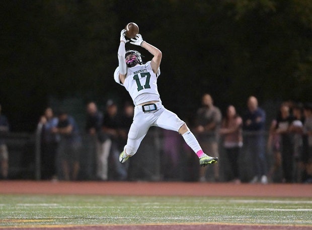 Miramonte's J.D. Pearce comes up with an interception against North Gate. (Photo: Jason Weed)