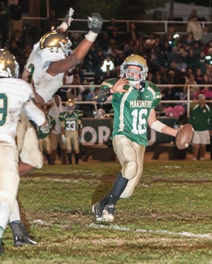 Jalen Canty rushes and towers over frightened
quarterback. 