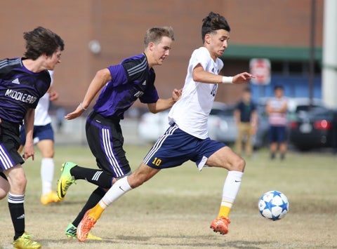 Junior Jhovani Gonzalez (white jersey) has led KIPP Denver Collegiate to an undefeated start and the top ranking in the Class 3A boys soccer ranks. Gonzalez is the second-leading scorer in the classification with 14 goals.
