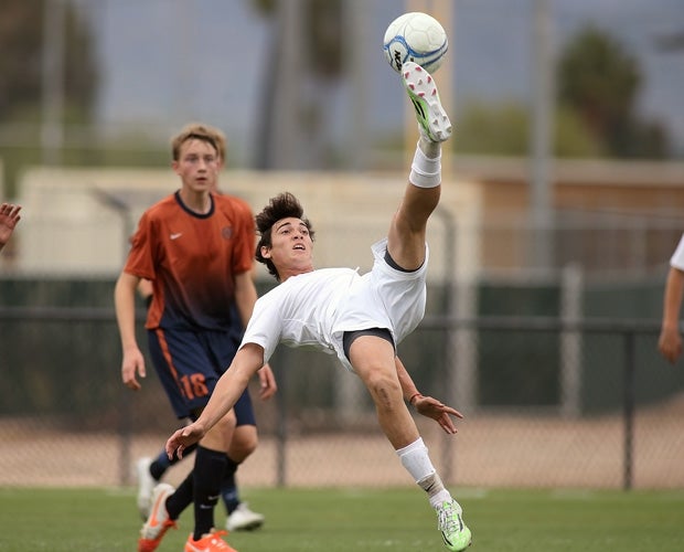 A Foothill (Ariz.) player does a scissor kick during a game against Cienega in the semifinals of the Brandon Bean Kickoff Classic in December.