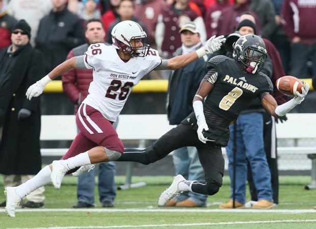 Paramus Catholic (N.J.) receiver Donald Stewart makes a diving one-handed catch along the sideline against Don Bosco Prep in a semifinal game for the NJSIAA Non-Public Group 4 state playoffs in November.