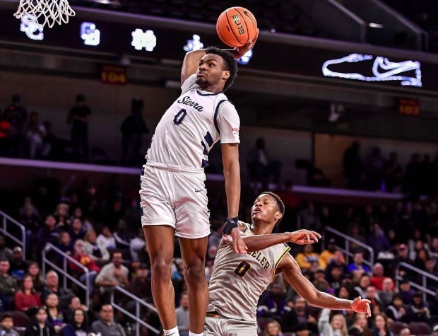 Bronny James knocked down five 3-pointers to finish with 15 points as the West fell 109-106 in the McDonald's All American Game in Houston on Tuesday. (Photo: Louis Lopez)