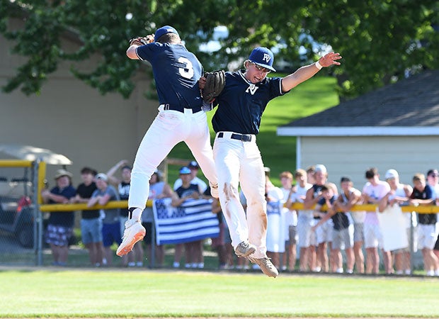 Two Pleasant Valley players celebrate the victory.