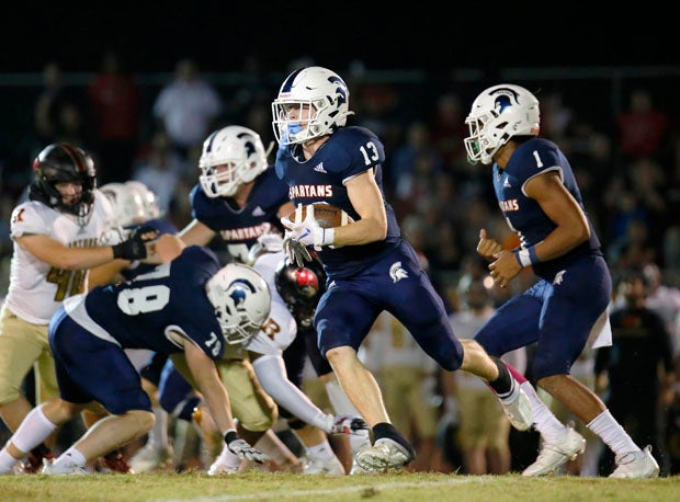 Summit's Brady Pierce (13) is not only one of his team's top tacklers, he's recorded the most interceptions and receptions.