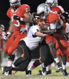 One of 27 tackles for Devon Dwyer in
his team's game against East River. 