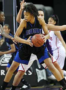 Junior 6-7 post Imani Stafford had
18 points and 19 rebounds.