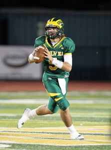 Zach Kline isn't terribly fast but
he's got good feet and superb
throwing mechanics. "I work at it,"
he says.