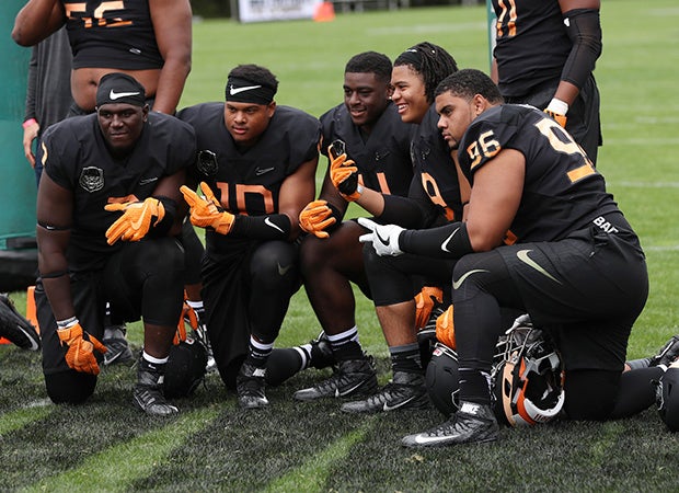 Chase Young (second from right) poses with a few of his fellow linemen during The Opening on Sunday.