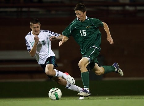 Kyle Vigil (15) and Mountain Vista were one of seven lower-seeded teams to win in a wild first round of the Class 5A boys state soccer tournament. The second round is Wednesday for 5A.