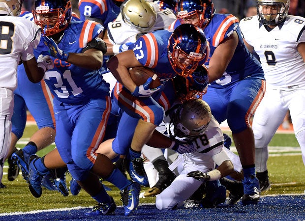 Bishop Gorman running back Jonathan Shumaker scores on a rushing touchdown during the first half of Friday night's showdown in Las Vegas. 