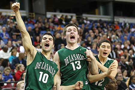 Dan Peera (10), Chris Mullin (13) and Steve Oronos (12) exalt De La Salle's 18-0 run en route to unlikely Northern California title. 