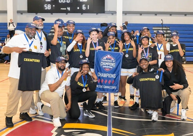 Bishop McNamara celebrates its victory at the Nike Tournament of Champions, helping the Mustangs jump 10 spots to No. 2 in this week's MaxPreps Top 25. (PHOTO: Darin Sicurello)