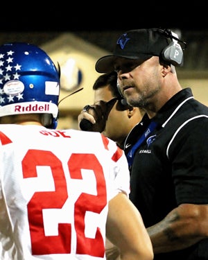 Clayton Valley coach Tim Murphy, who looks
like he could still play, attended College Park.