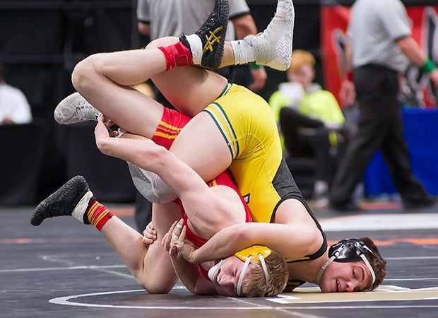 Two Colorado wrestlers battle during the CHSAA Wrestling Championships.