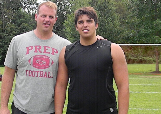 Jon Daniel Runyan (right) with his father and former NFL lineman Jon Runyan. 