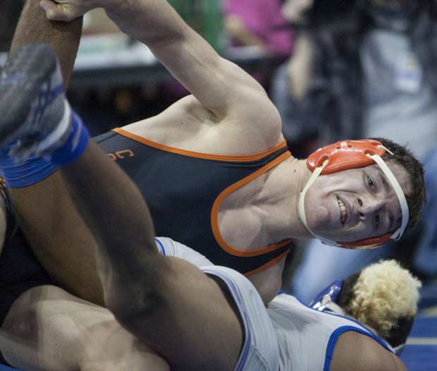 Corona del Sol's Ethan Tursini, in orange, is one of the favorites heading into the Flowing Wells Invitational.