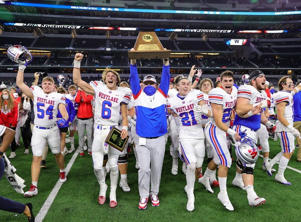 Westlake coach Todd Dodge holds up hardware after beating his son and Southlake Carroll on Jan. 16 for the Class 6A-1 Texas title.  