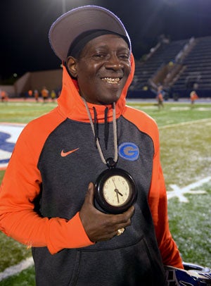 Rapper Flavor Flav flashes his grill and the
time after Gorman's victory. 