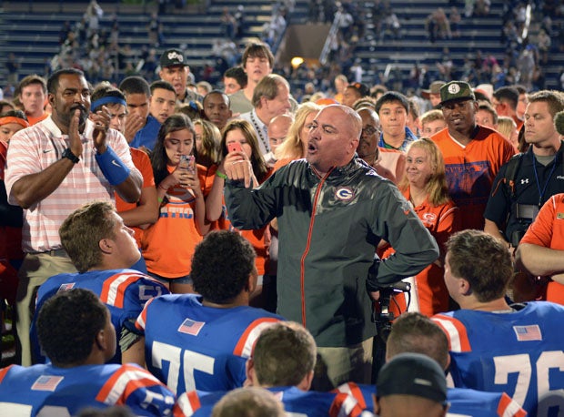 Tony Sanchez addresses his Bishop Gorman team after a 34-31 win over visiting St. John Bosco in a battle of two of the nation's top teams Friday. 