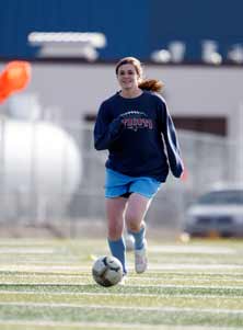 Kelly Cobb needs more than just gamesto stay at a national-caliber level. Her practice schedule goes above and beyondwhat many players do because of howfar Alaska is from many soccer hotbeds.