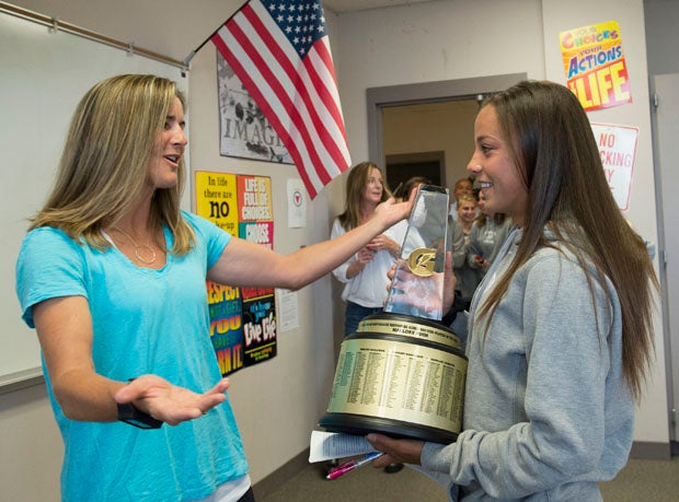 Mallory Pugh (right) is surprised with Gatorade Player of the Year award Thursday by legendary USA player Brandi Chastain.