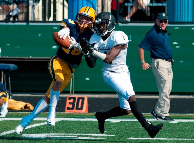 Scott Arthrell of St. Ignatius (Cleveland) knocks away a pass destined for Tyrone Washington of Paramus Catholic (N.J.).