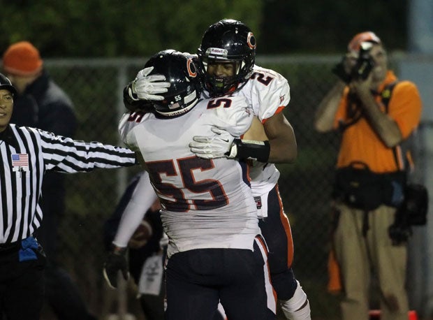 Donovan Lee celebrates one of his four touchdowns in his team's huge win over Serra.