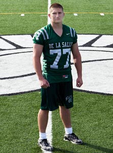 Two-way lineman Justin Walker is
also an accomplished wrestler.