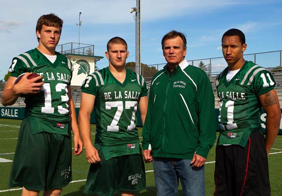 From left to right: Bart Houston, Justin Walker, head coach Bob Ladouceur, Michael Barton