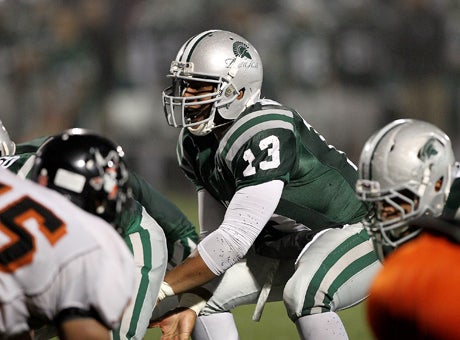 De La Salle quarterback Chris Williams couldn't have been better Saturday in the rain, completing 9 of 12 for 145 yards and four touchdowns in his team's 52-7 win over Logan for the North Coast Section Divison I title.