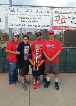 In addition to playing three sports,
Pulsifer volunteers as a coach
for his sister's softball team.