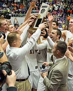 Lewis celebrates with his team after
winning the state title.
